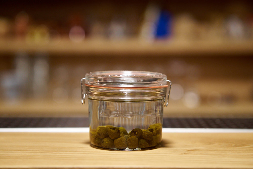 Gin infuso olive affumicate